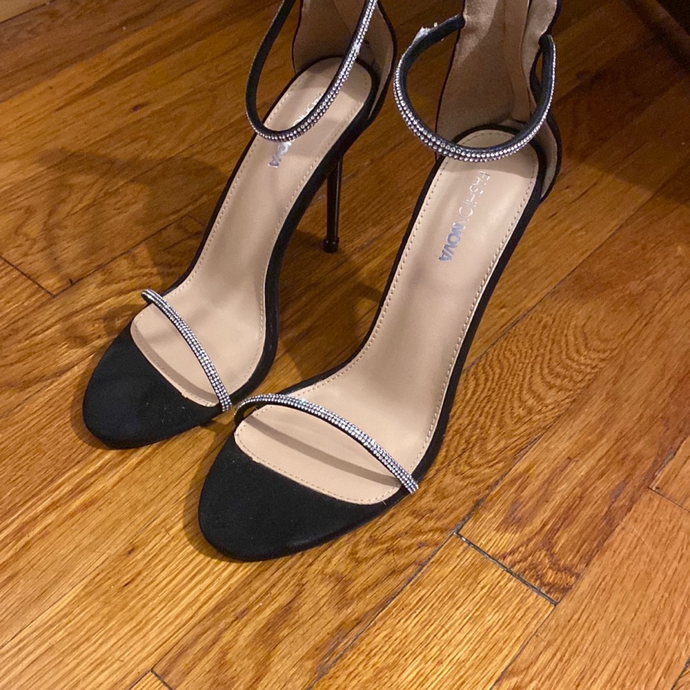 Never worn. Size 10 heels.